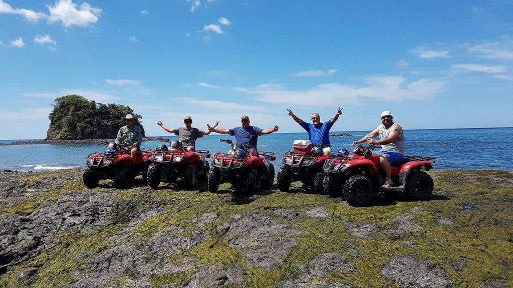 Group of 5 atvs with men