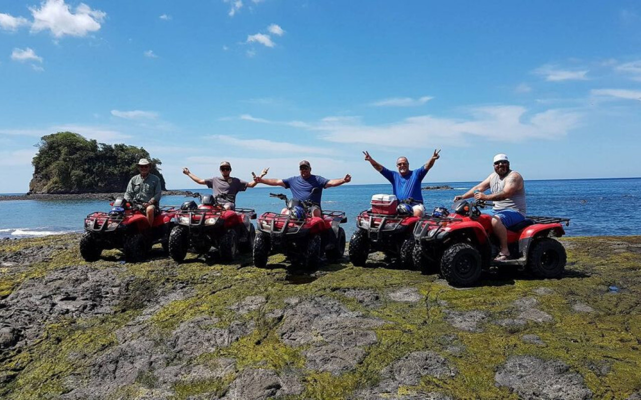 Group of 5 atvs with men